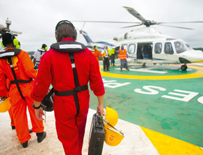 Shell staff board a helicopter near Port Harcourt, Nigeria. (photo)