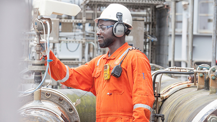 An engineer carries out regular checks on board the Bonga floating facility in deep water Nigeria (photo)