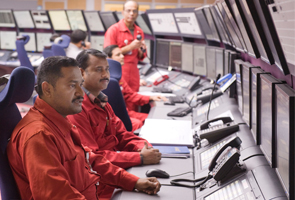 Operators in the central control room, Pearl GTL, Qatar. (photo)