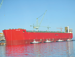 The massive hull of Shell’s Prelude is floated from its South Korean dry dock. (photo)