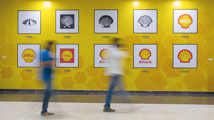 Wall at the new technology hub in Bangalore showing the evolution of the Shell Pecten. (photo)