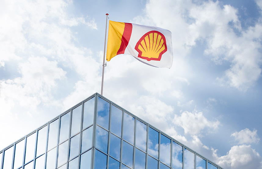 Exterior image showing the Pecten flag flying above a Shell building (photo)