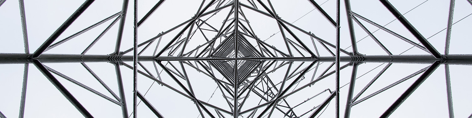 Transmission tower supports an overhead power line (photo)