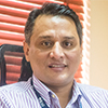 Satish Raj Pandey, Acting Country Director, Family Health International (FHI 360), Abuja, Nigeria (portrait photo)