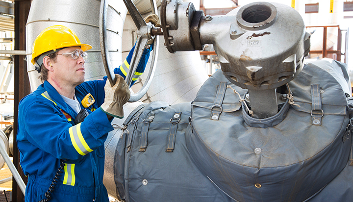 A man working at the Quest carbon capture and storage facility in Alberta, Canada. (photo)