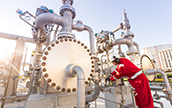 Worker working on a ventil at LNG regasification terminal in Gibraltar (photo)
