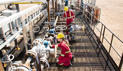Workers working on a pipeline at a carbon capture and storage site (photo)