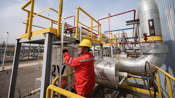 The engineer checking propane pipe outside the house of Mechanical Refrigeration system in the plant at Changbei, China 2023
(photo)